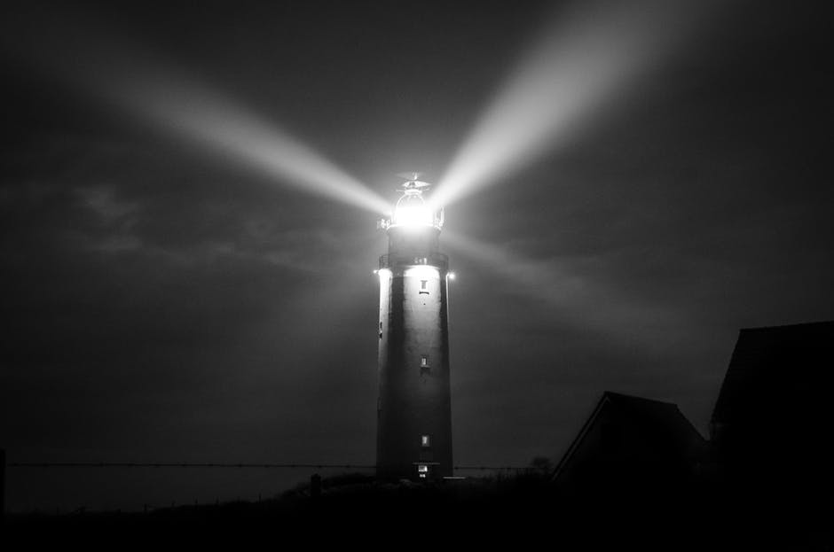 lighthouse-night-sea-coast-745729